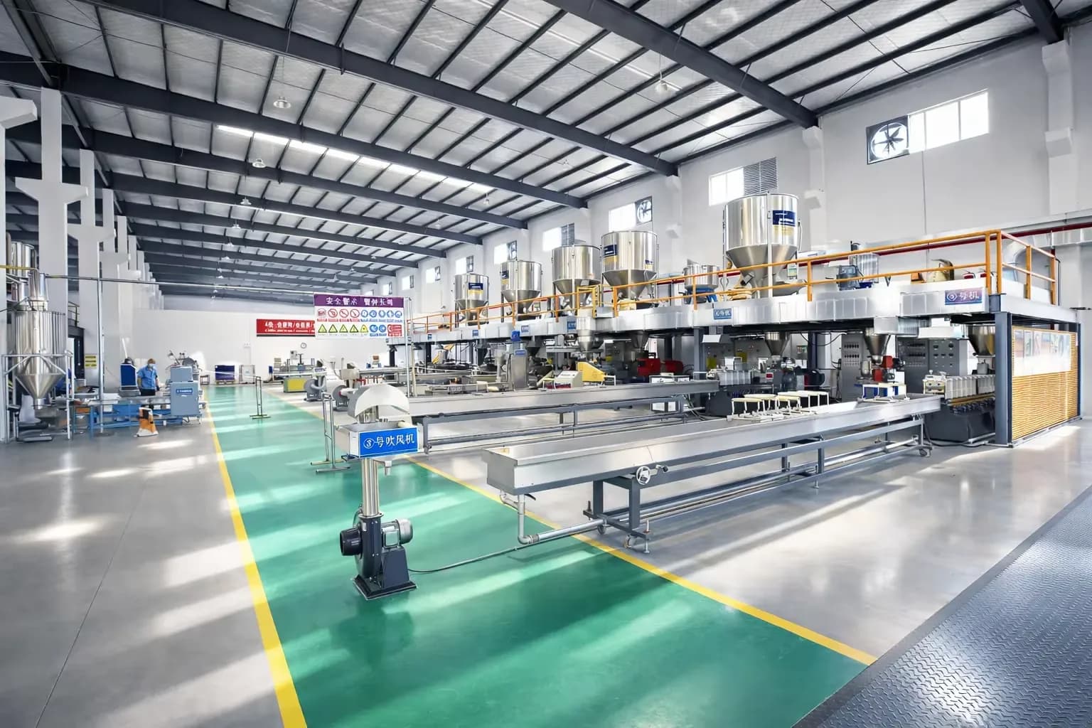 Twin-screw extrusion lines at the Taiyi Polymer manufacturing site in Yancheng.